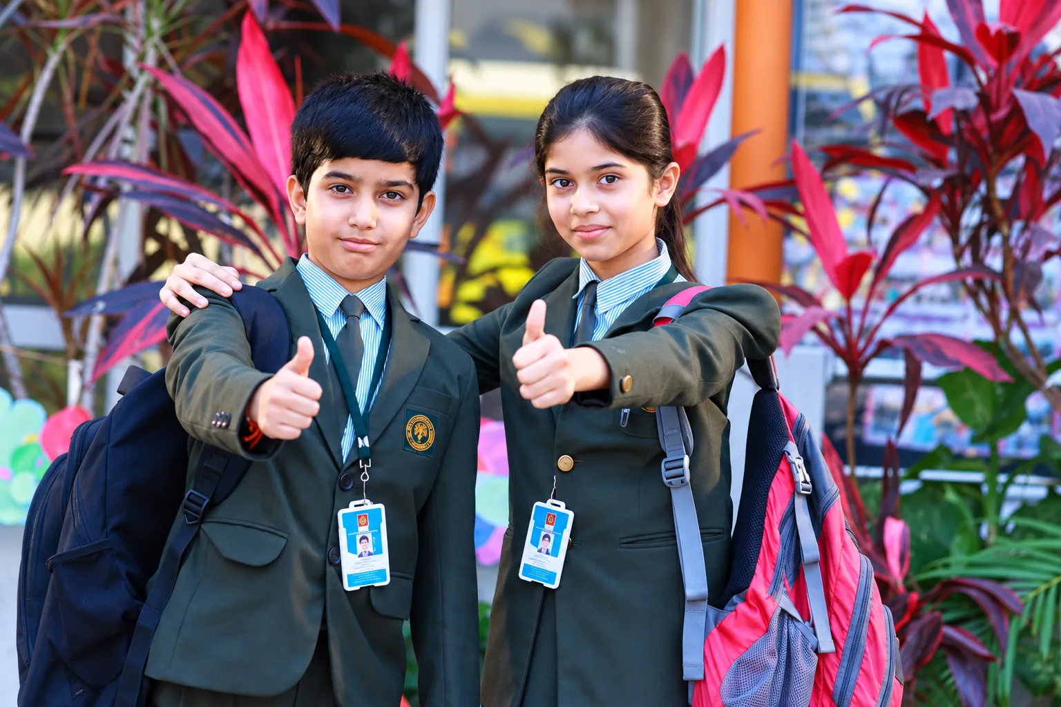 Oakwood International School students smiling together outdoors